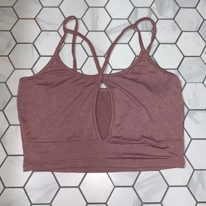 Plum crop top. Cross straps. Open chest.